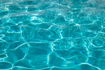 Surface of pool water. Blue sea water background texture. Water with ripples. Water waves pattern texture background. Abstract banner background.