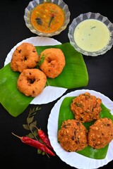 South Indian famous snacks - medu Vada and parippu Vada, South Indian fritters, served with chutney and sambar