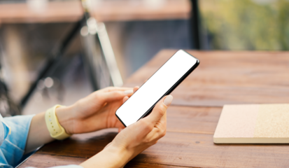Mockup image of a woman using smartphone with blank screen. Transparent. Cut out. PNG
