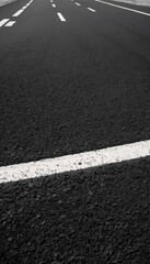 black dividing asphalt lines white road asphalt road abstract accident auto automobile background black brake car closeup copy danger detail direction distance drive family fast hazard highway