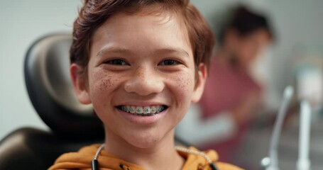 Face, happy and child patient with braces for dentist visit, checkup or dental cleaning at clinic. Portrait, orthodontics and boy with smile for teeth alignment treatment, oral care or consultation. - Powered by Adobe