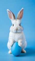 Obraz premium background easter rabbit egg easter blue blue concept bunny painted holiday easter rabbit rabbit hare egg blue spring holiday festive gift present animal cute concept little happy pet young baby