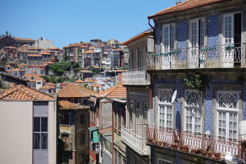 A captivating view of Porto&rsquo;s historic city center, showcasing a mix of terracotta rooftops and charming architecture