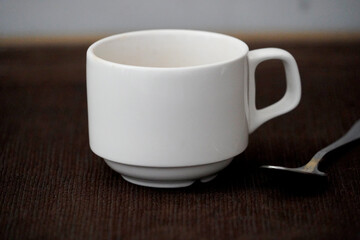 White coffee cup with spoon