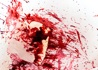 Crumpled bloody tissue paper with blood-soaked floor, murder, crime