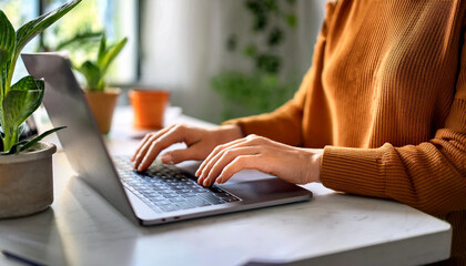 Empowered Woman Working on Laptop in a Modern Home Office
