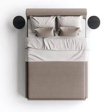 A top-down view of a double bed with a beige upholstered headboard, white pillows, and matching round bedside tables on both sides.