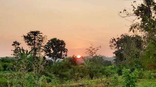 Evening view near the village river as the sun sets