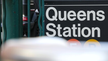 New York subway sign, Queens underground metro station. Metropolitan entrance fence, public...
