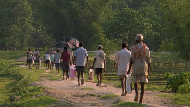 Group of people walking in rural India