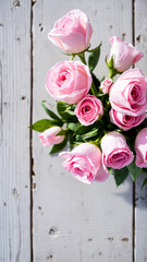 Pink Roses on a White Wooden Background