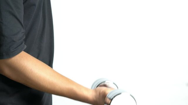 male model exercise with steel chrome dumbbell on white background