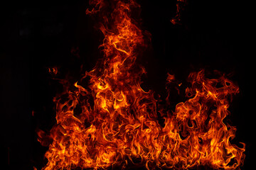 Fire flame burning and fire glowing on black background.