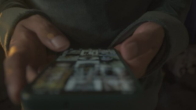 scrolling smartphone close up