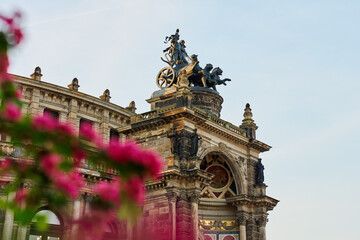Detailed view of Semperoper Opera house facade in Dresden with architectural details and chariot sculpture on top. Germany architecture with historical building