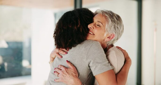 Hug, smile and senior woman with volunteer in house for connection, care and bonding together. Happy, family and elderly foster mother embracing daughter for greeting at visit in retirement home.