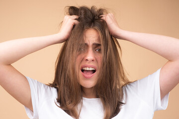 Woman with hair loss problem on studio.