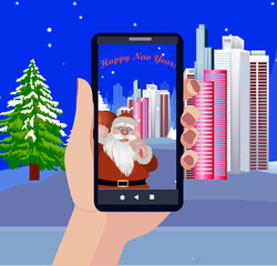 Hand holding a mobile device that shows on its screen Santa Claus passing through the city on New Year's Day. Congratulation text  Happy New Year is also seen on screen. Vector illustration.