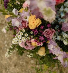 Purple, yellow and white floral arrangment