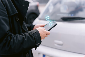 Hands of a Man Using GPS App