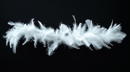 Obraz premium White feather boa isolated on black background, party isolated png like style.. Isolated on black background png like style. Created using Generative AI Technology 