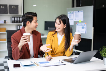 Portrait of success business people working together in office. Couple teamwork startup concept