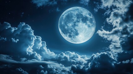 The moon glowing behind the moving clouds