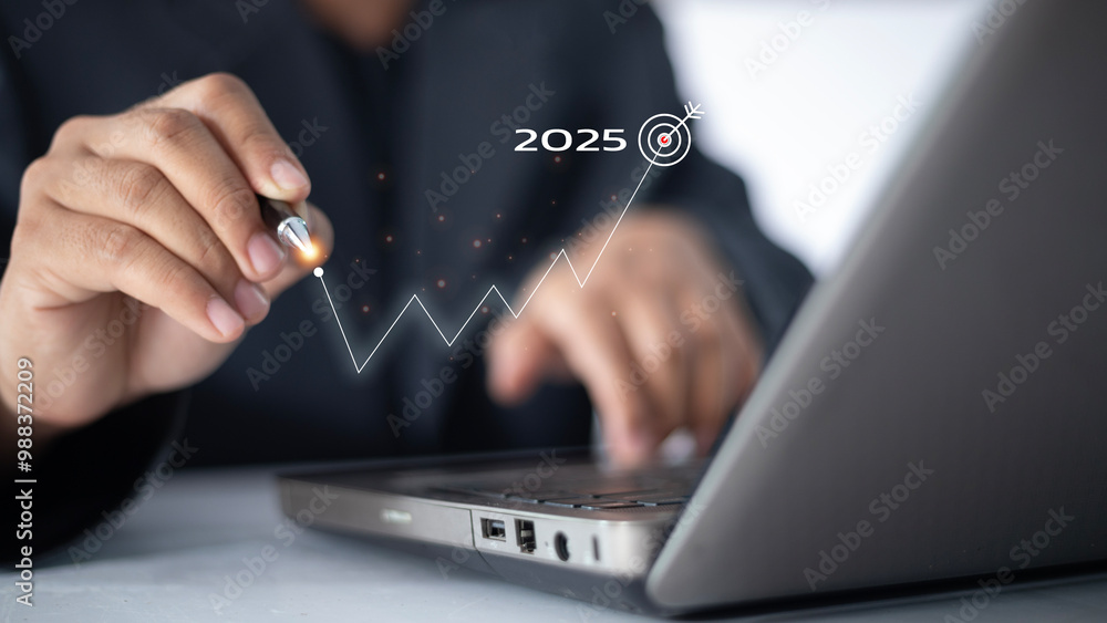 Poster a person is using a laptop with a graph on the screen that shows a line going up