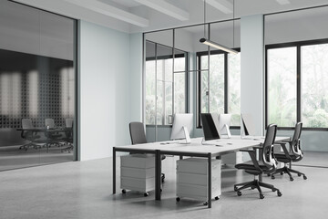 Modern office interior featuring an open space with large windows, desks, and ergonomic chairs. Minimalist design a professional business environment. 3D Rendering