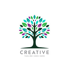 Fototapeta premium Creative artistic tree logo concept. eco friendly tree logo. Colorful leaf tree logo. minimalist tree vector icon logo