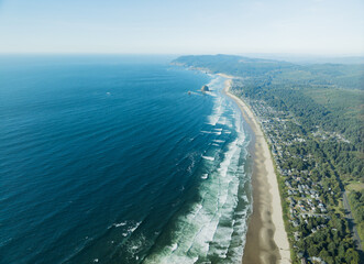 The ocean is calm and the beach is empty