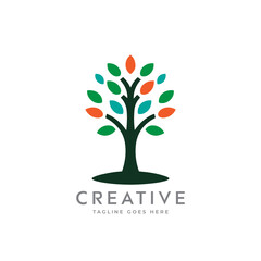 Obraz premium Creative artistic tree logo concept. eco friendly tree logo. Colorful leaf tree logo. minimalist tree vector icon logo