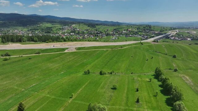 Road construction site, infrastructure development of Lesser Poland countryside, aerial
