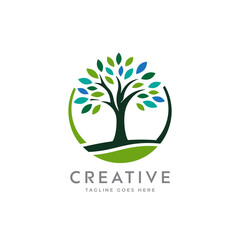 Obraz premium Creative artistic tree logo concept. eco friendly tree logo. Colorful leaf tree logo. minimalist tree vector icon logo