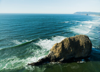 The ocean is calm and the waves are small