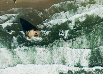 The ocean is calm and the waves are small