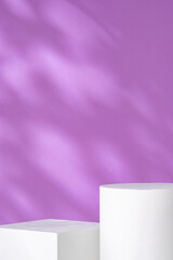 White geometric shapes against a soft purple background with gentle shadows