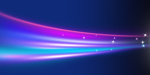 Colorful glowing light trails swirl with sparks on dark blue background. Neon colored curved light beams.