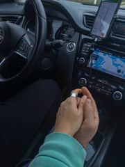 Couple Holding Hands in Car