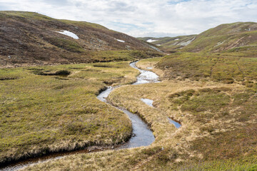 A small stream flowing in the highlands of the Varanger Peninsula National Park, Vardø, Finnmark