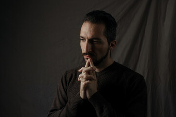 Male portrait on a gray background