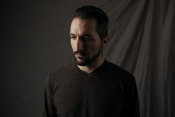 Fototapeta premium Male portrait on a gray background