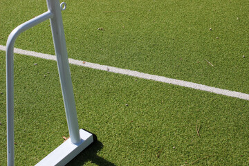 tennis court covered with artificial grass close up