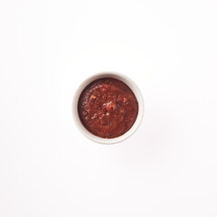 Delicious homemade tomato sauce in a white bowl against a clean background capturing the essence of Italian cooking
