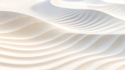 Obraz premium White sand forming smooth wavy dunes in the desert
