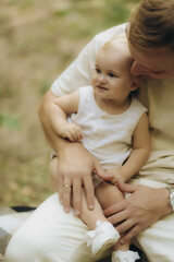 Father and daughter walking in the forest