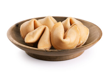Wooden bowl with fortune cookie isolated on a white background. With clipping path.