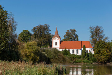 Fototapeta premium A small rural church on the lake shore