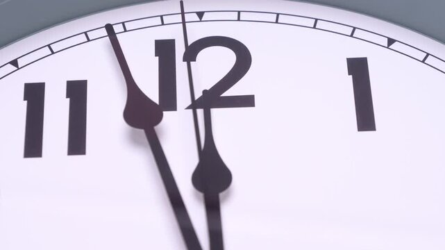 White clock says it's almost noon, It's time to eat.