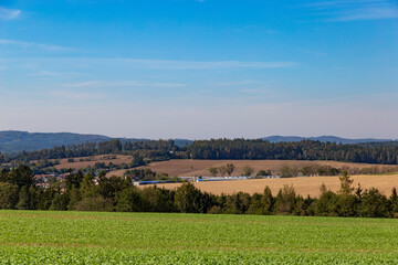 Blue sky over european countryside. Early autumn.